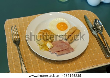 Set of american breakfast on table.