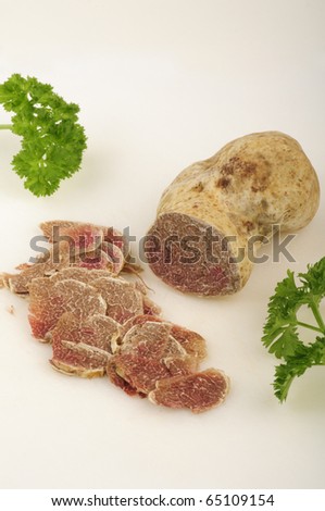 White truffle from Tuscany, partly sliced.
