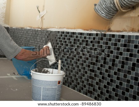 Home improvement - grouting mosaic tiles.