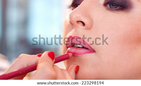 Professional Make-up. Lipgloss. Lipstick