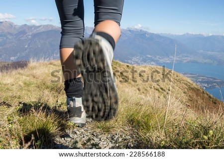 Hiking feet at top of mountain-Lake view