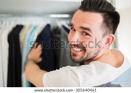 Selecting wardrobe in a good boutique