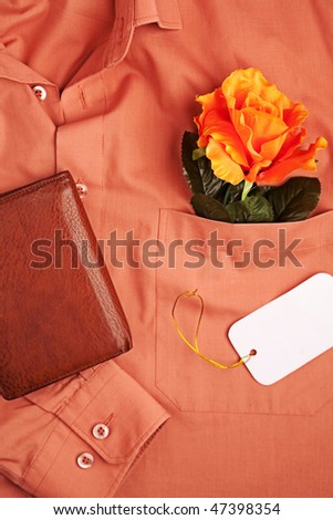 Orange man shirt with empty note and wallet
