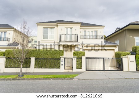 Melbourne, Australia - August 30, 2015: Contemporary two storey Australian house in Melbourne during daytime.