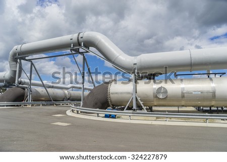 Large sewage pipes in a sewage treatment plant during daytime