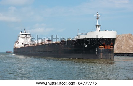 Laker on the Cuyahoga River  A Great Lakes self-unloading bulk carrier ship (also known as a \