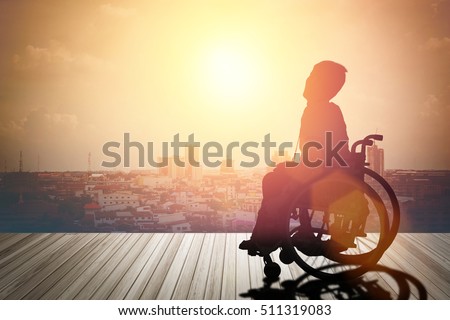 silhouette of disabled on wheelchair or background.day of the disabled person .Concept cripple or disabled .art Plant Dawn View Cloud Calm Card  Bright  Blue World model   love night sunrise alone sea
