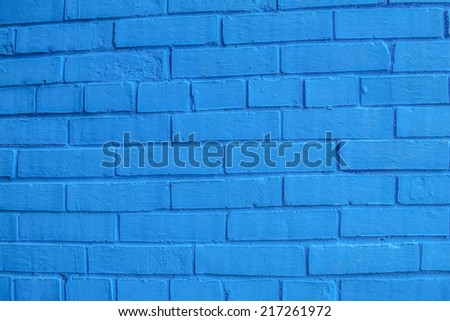 Background. Shabby blue brick wall.