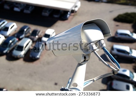 Video surveillance camera installed on a vehicle parking