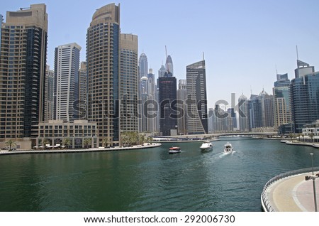 DUBAI, UNITED ARAB EMIRATES - JUNE 15 : view of Dubai Marina Towers in Dubai, United Arab Emirates. Dubai Marina is a district in Dubai and an artificial canal city.