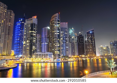 DUBAI, UAE -JUNE 15: Dubai Marina at night, on JUNE 16 2015, Dubai, UAE. In the city of artificial channel length of 3 kilometers along the Persian Gulf.