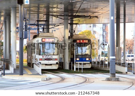 KUMAMOTO,JAPAN -  DECTEMBER 30,2013 : The easiest way to access tourist spot in Kumamoto city is by using local trams service kumamoto, japan