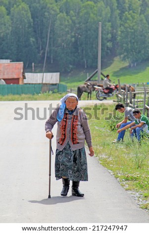ALTAI,CHINA - JULY 21,2012 : Unidentified female at altai ,Hemu Village is the one of the three villages of Tuwa Mongols in China. They are considered the offspring of Genghis Khan Troops.