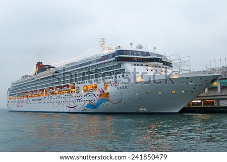 Hong Kong, China - December 26, 2014 : Star Cruises Pisces docked at Victoria Harbor, Hong Kong. Hongkong is a major tourist city in Asia,More than 40000000 visitors a year.