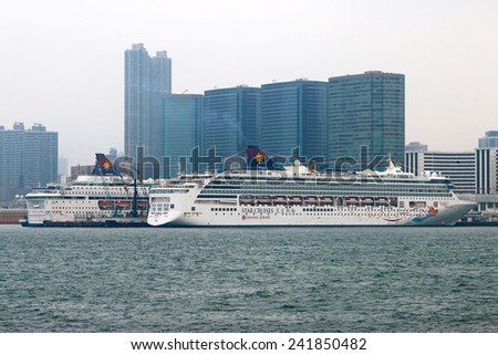 Hong Kong, China - December 26, 2014 : Star Cruises Pisces docked at Victoria Harbor, Hong Kong. Hongkong is a major tourist city in Asia,More than 40000000 visitors a year.