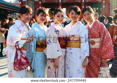 TOKYO, JAPAN - JANUARY 09,2015 : Young Japanese women wearing a traditional dress called Kimono at Senso-ji Temple in Tokyo, Japan