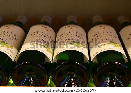 SAPPORO, JAPAN - FEBRUARY 12,2015 : Wine bottles on wooden shelf in wine store at Ikeda Wine Castle, Hokkaido, Japan