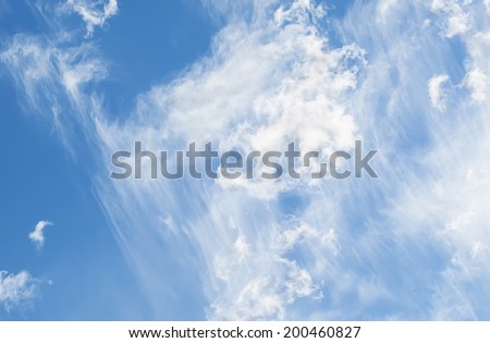 Science Meteorology mixed cloud types with  high level wispy cirrus cloud