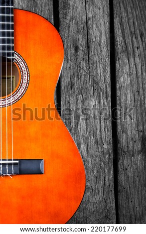spanish Guitar on wood background