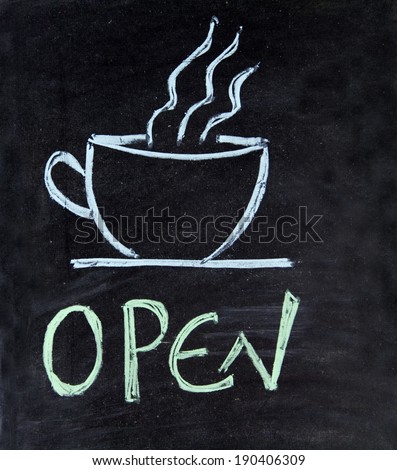 Open sign for bar written on the blackboard