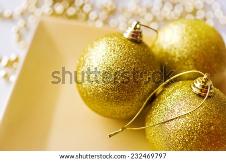 Christmas decoration - golden glass balls with gold pearls