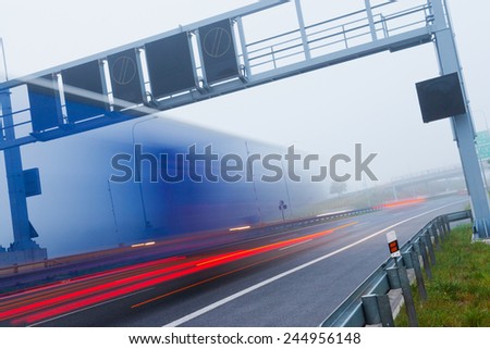 toll gate, City expressway road in the morning fog, Lochkov tunnel, Prague, Czech republic