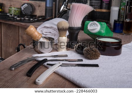hairdressing equipment like razor and  brush and mousse and  towel  in  professional  hairdressing salon