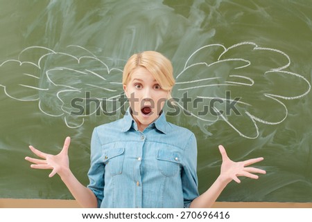Brain blow. Female student getting her brains blow with vapor chalk drawing on backboard