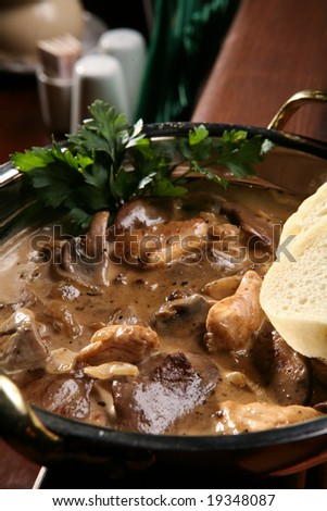 Cooked mushrooms with white bread