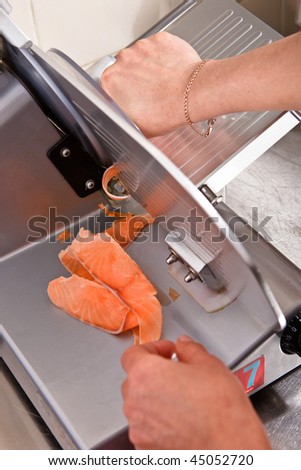 Chop frozen salmon into thin slices