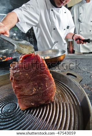 Chef check the steak