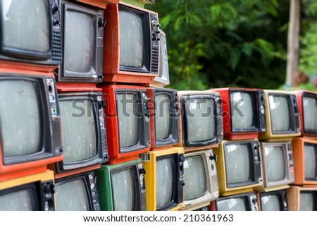 Chiangmai, Thailand-June 11, 2014: Many Old televisions in unidentified garden place set for decorate place on June 11, 2014, Chiangmai, Thailand.