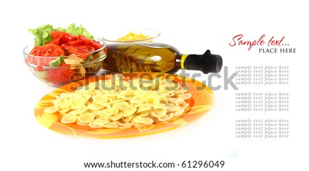 A bottle of olive oil with pasta and black olives isolated on a white background.