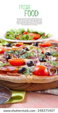 Pizza with dry cured ham and salad