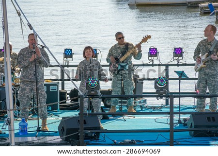 US Army band performs at the Southwest fireworks waterfront festival in Washington D.C. during the cherry blossom festival season. 4 April, 2015