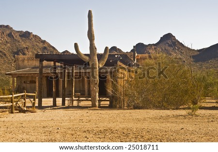 Old western cantina and palapa with picnic table outside of Tucson, Arizona.