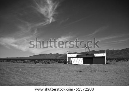 Old airfield at Amboy,California, a modern ghost town in the Mojave Desert on old Route 66 in black and white