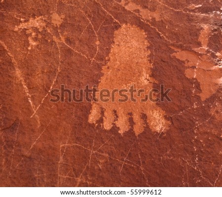 Ancient Native American petroglyph of a foot from the Valley of Fire State Park near Las Vegas, Nevada