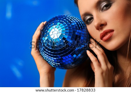woman with sphere. blue background