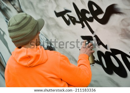 Paris - France - 27 May 2013 - urban art - man with paint bomb
