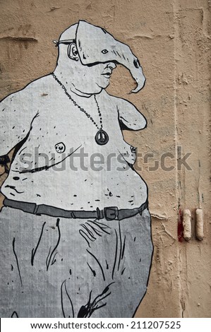 Paris - France - 27 May 2013 - urban art - fat man