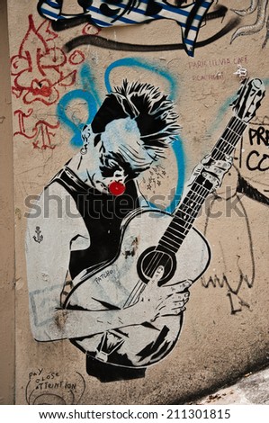 Paris - France - 27 May 2013 - urban art - musician play guitar