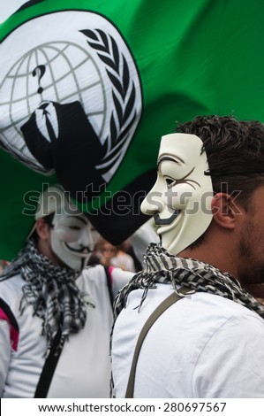 STRASBOURG - France - 23 May 2015 - people with anonymous mask during the demonstration against Monsanto and the transatlantique treated for the production of GMO in Europe -