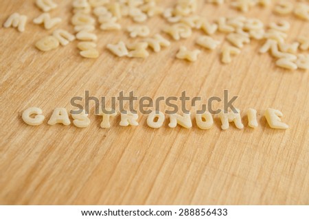 Alphabet pasta forming the text \