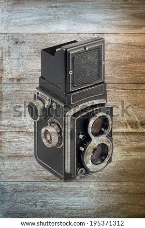 old Mediam format Camera in Wood background
