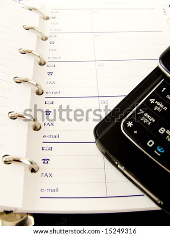 Notebook On Financial Paper telephone mobile fax