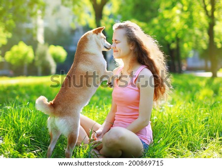 Dog and owner in park