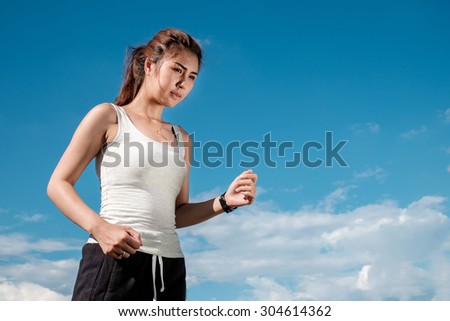 female runner running at park. Healthy fitness woman jogging outdoors.