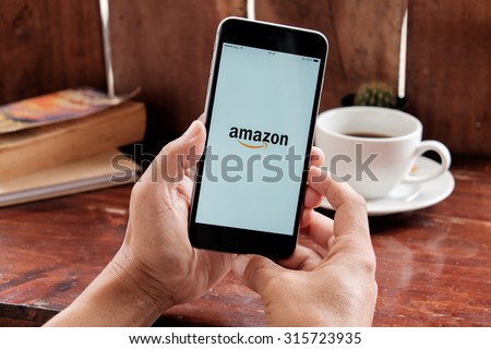 CHIANG MAI, THAILAND - SEP 12, 2015: Amazon logo on iPhone 6 plus screen.Amazon.com, Inc. is an American international electronic commerce company. It is the world\'s largest online retailer.