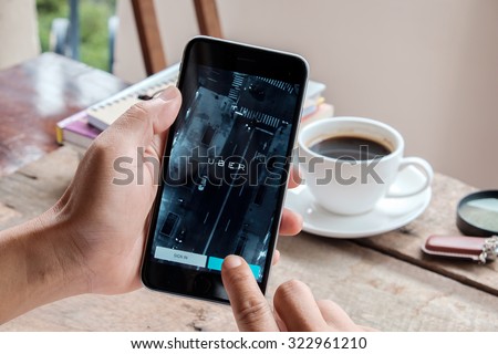 CHIANG MAI,THAILAND - OCT 02,2015 : A man hand holding Uber app showing on iPhone 6 plus,Uber is smartphone app-based transportation network.